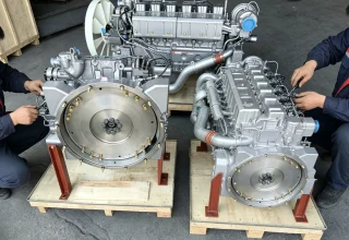 Complete Shacman heavy-duty truck diesel engine on wooden pallet, genuine OEM parts